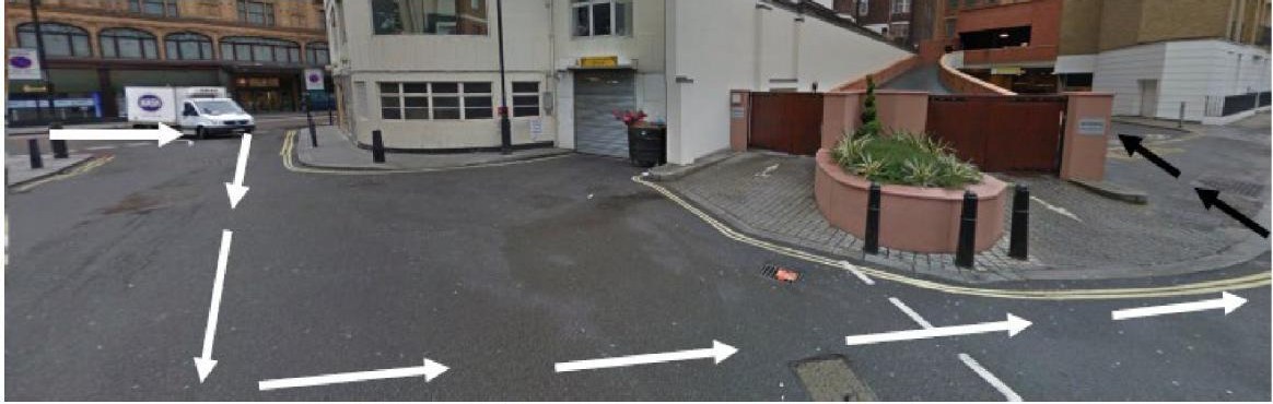 Street view of Trevor Square with arrows showing the turn towards Harrods Receiving Bank.